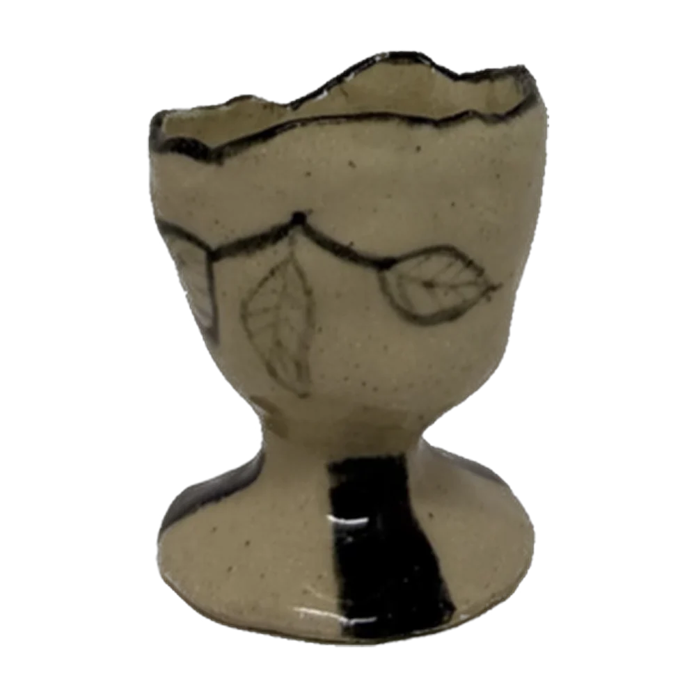 Tea cup — Clay cream, black face